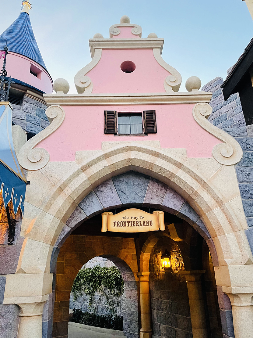 This Way to Frontierland sign in Sleeping Beauty Castle Disneyland