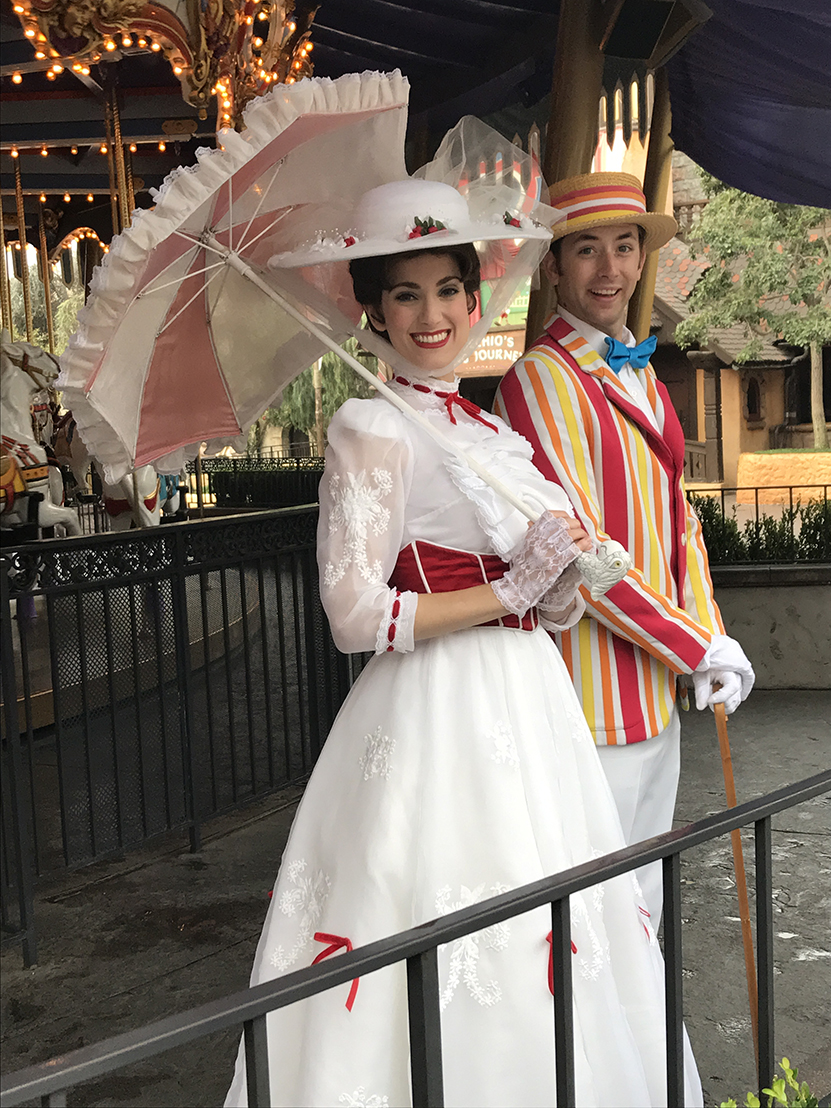 Mary Poppins and Bert near King Arthur's Carrousel in Disneyland