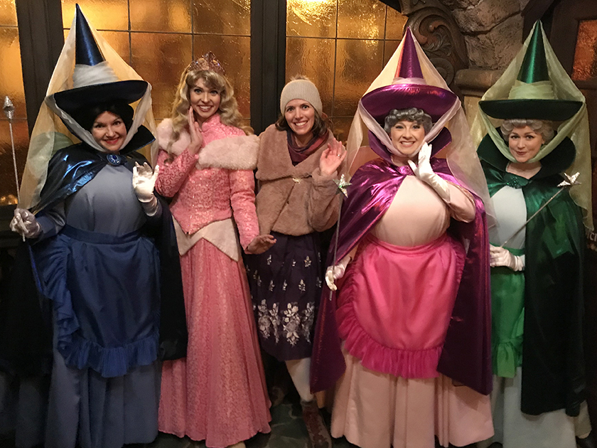 Club Cup Challenge characters Merryweather, Aurora, Flora and Fauna pose with Shannon Laskey