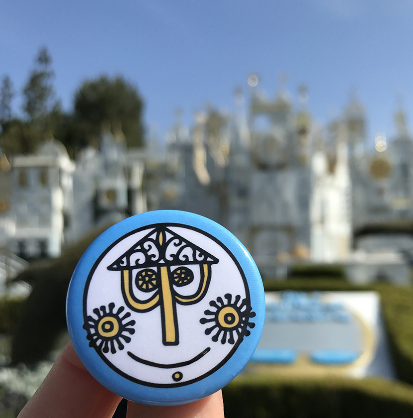 It's a small world clock face button in front of the attraction in Disneyland