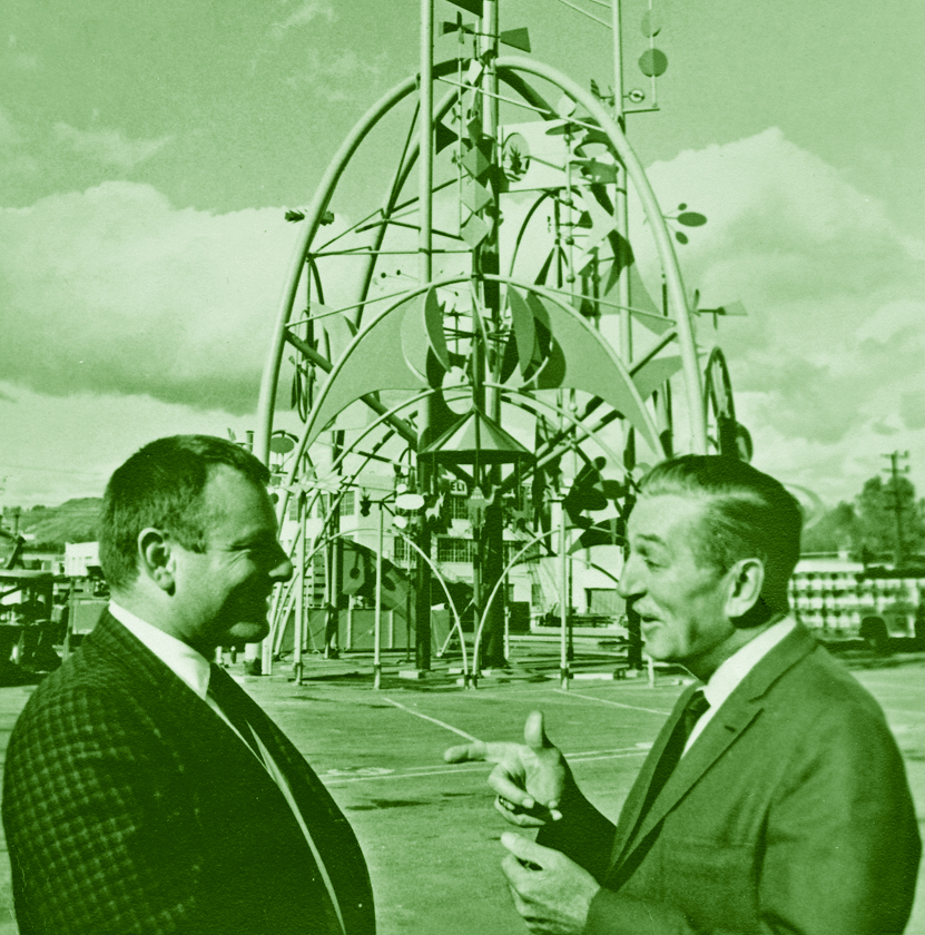 Rolly Crump and Walt Disney talk near Tower of the Four Winds