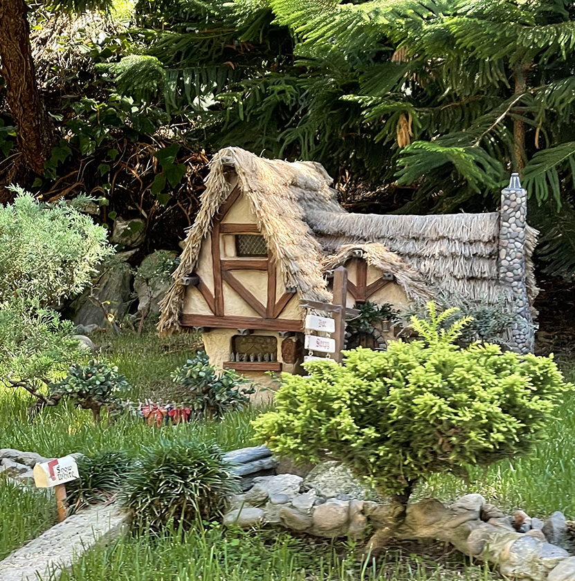 Snow White's Cottage and mailbox on Storybook Land Canal Boats