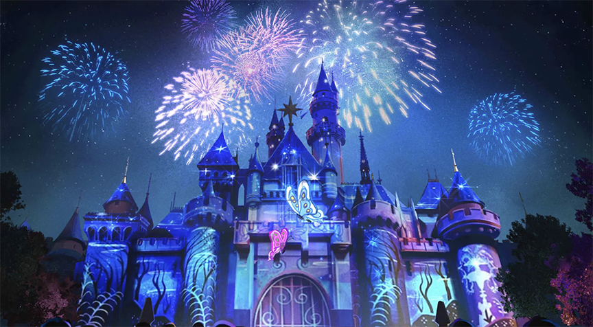 Disneyland Castle lit up with the Wondrous Journeys show